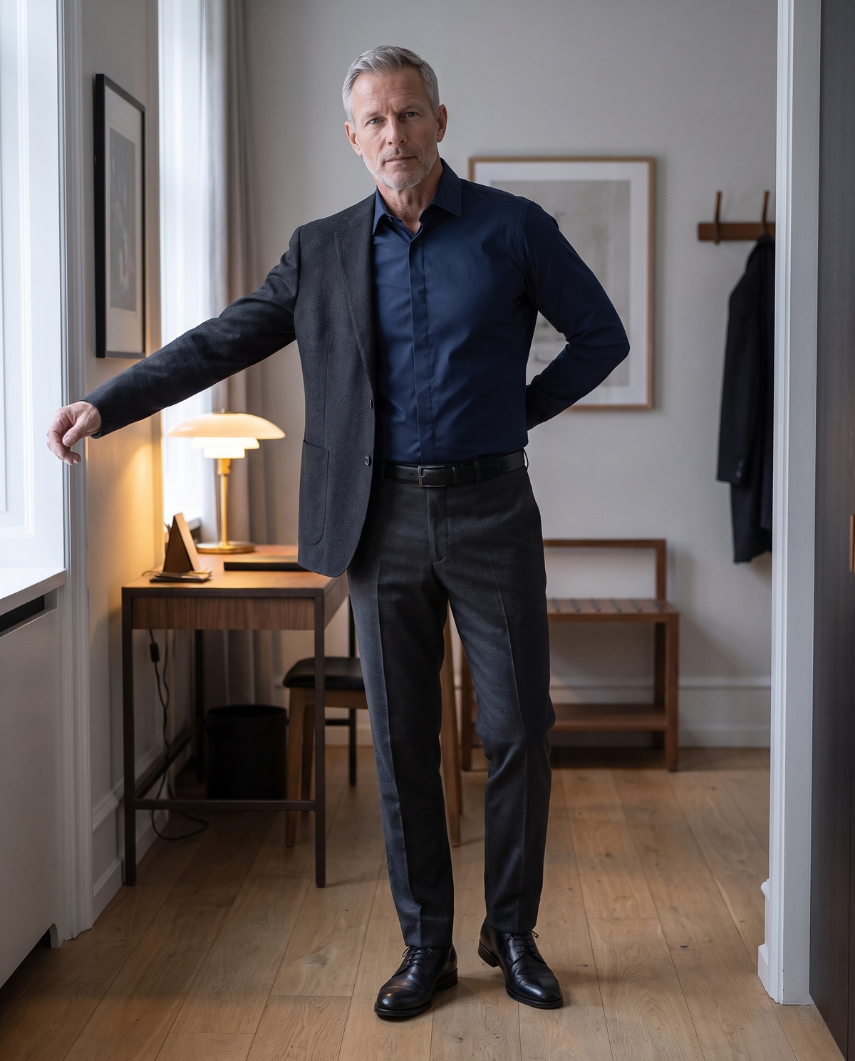 Mature man putting on a jacket over the navy Alfonso shirt