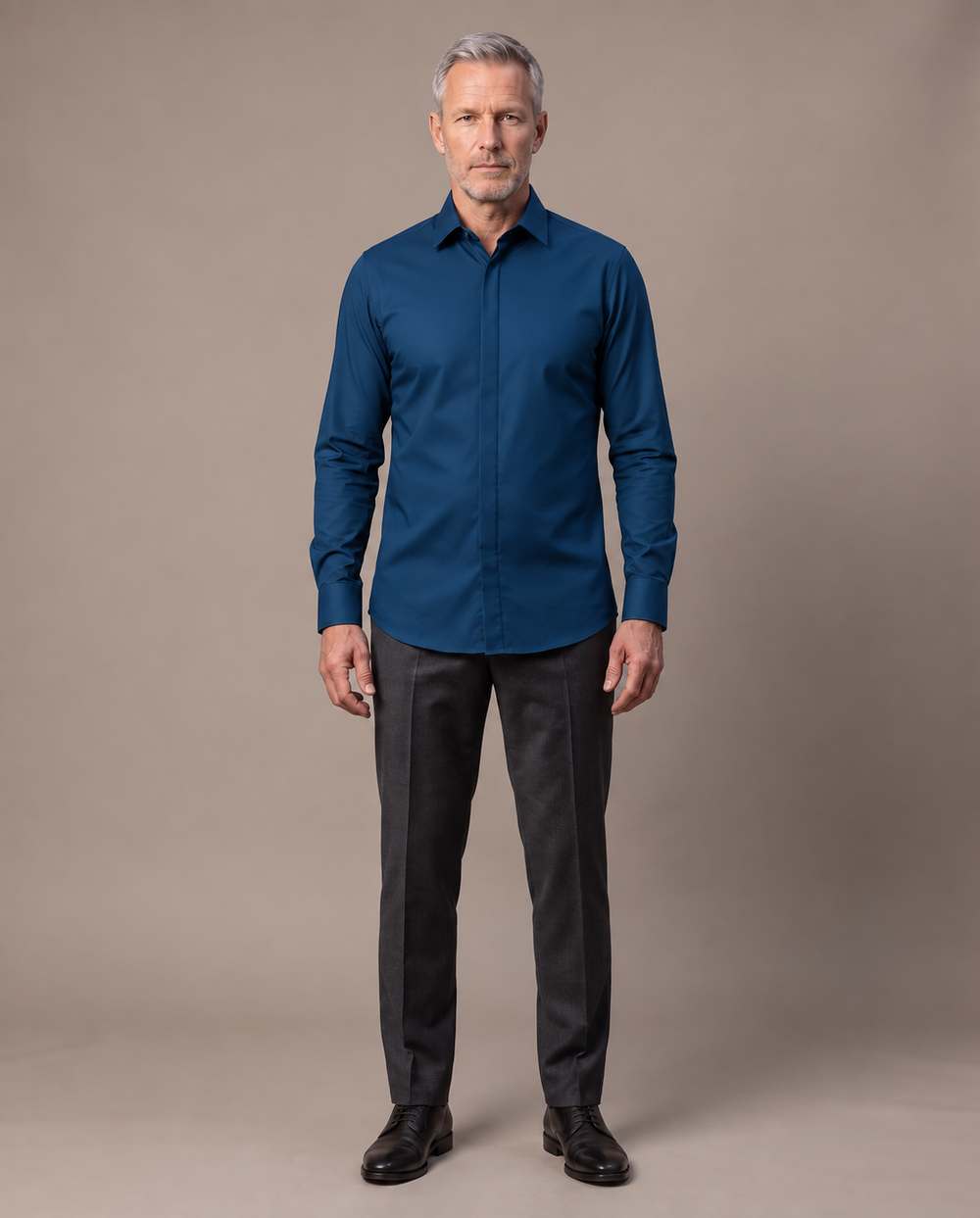 Front view of a mature man wearing the navy Alfonso shirt