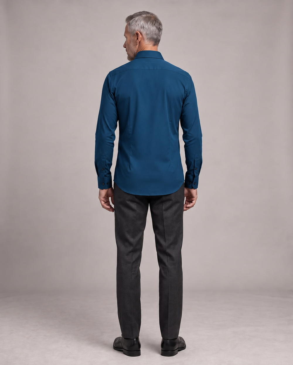 Back view of a mature man wearing the navy Alfonso shirt