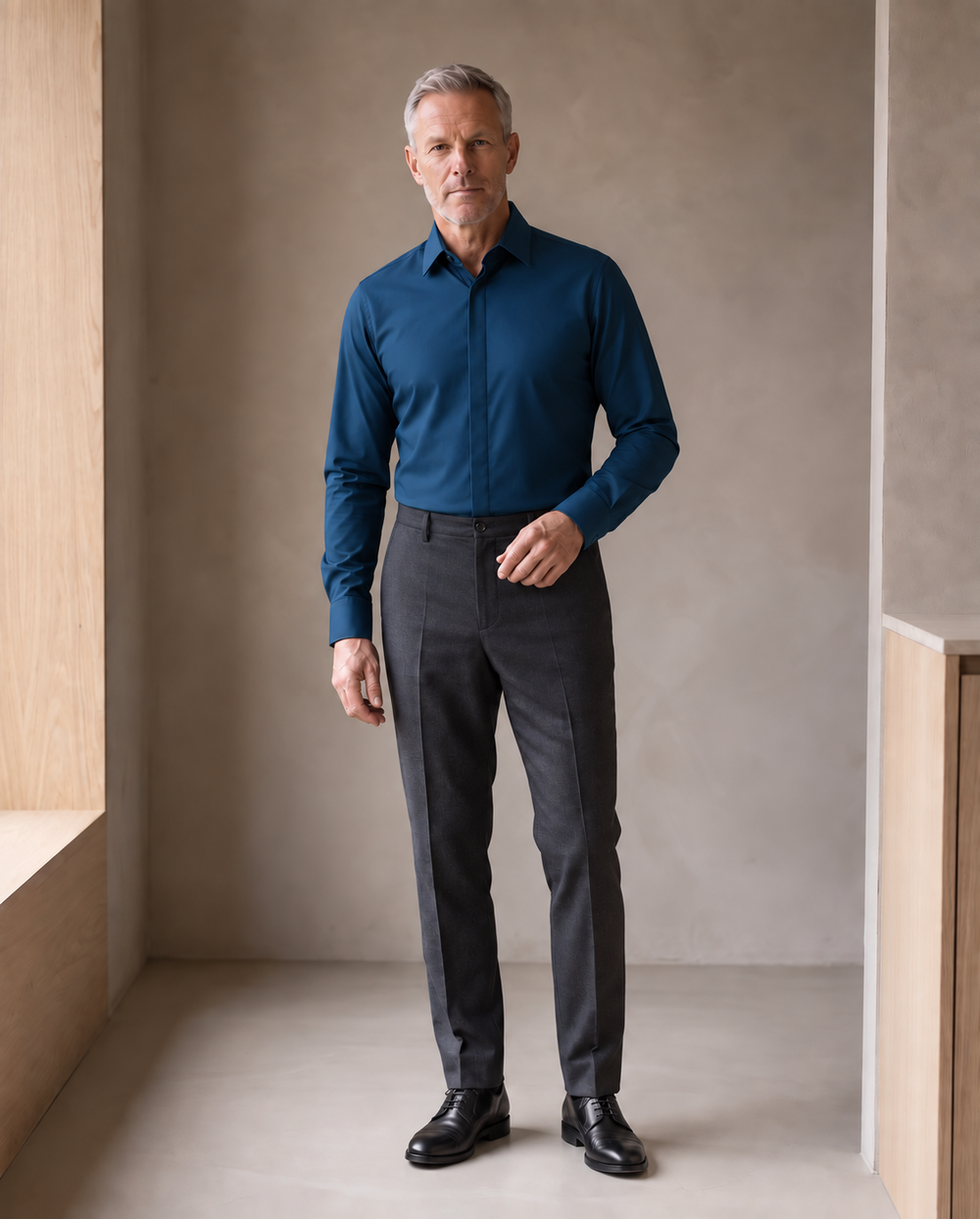 Mature man wearing the navy Alfonso shirt untucked